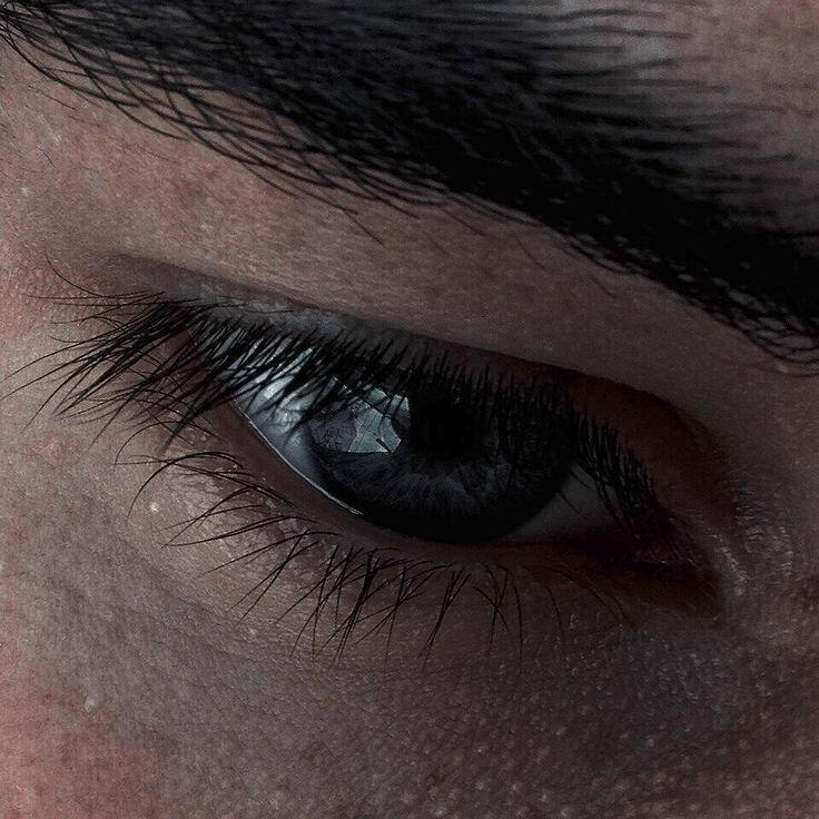The color grey, inherited from his father who's eyes were a similar shade of color; or lack their of.